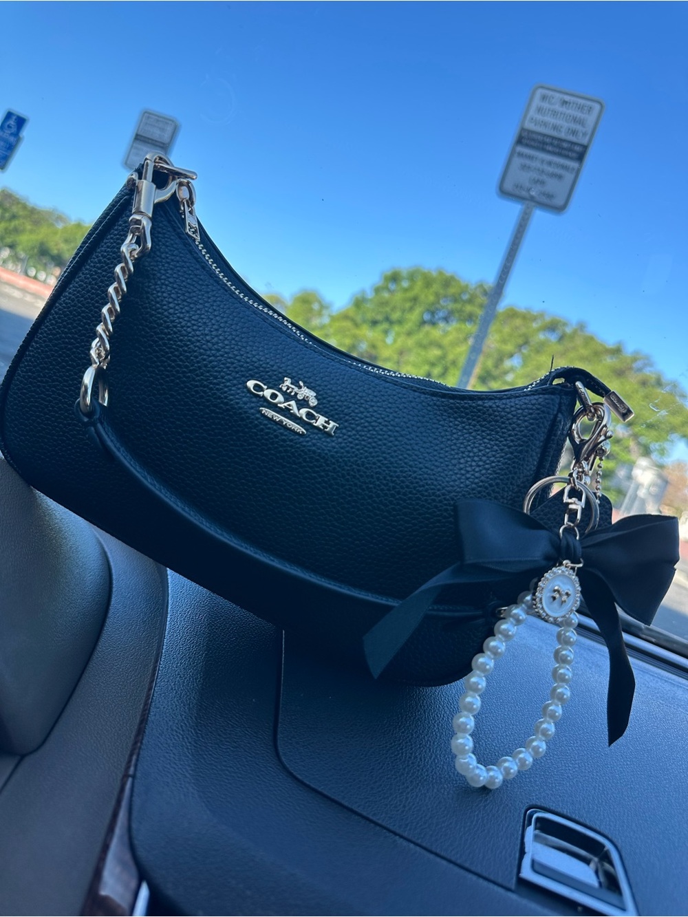 Coach Black Pebbled Leather Mini Shoulder Bag with Pearl Charm and Bow